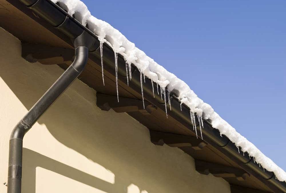 Winter Whiteout: Guarding Your Roof Against Damage from Snow